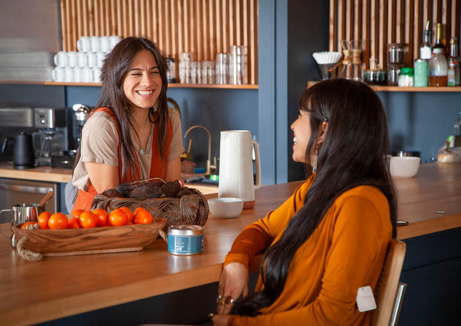 friends talking across a countertop