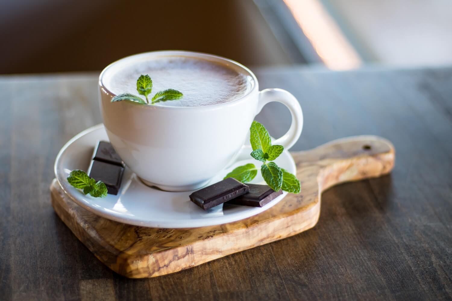A cup of peppermint cacao made with peppermint tea and ceremonial grade cacao