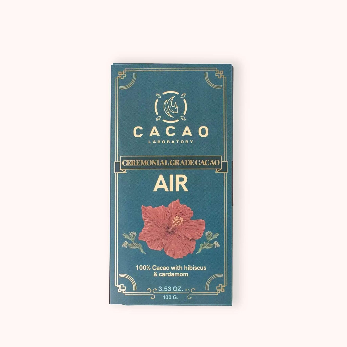 A single rectangular chocolate bar package labeled 'Cacao Laboratory' and 'Air', shown upright on a plain light background. The package is dark teal with gold decorative border lines and text, plus a large pink hibiscus flower illustration near the bottom.
