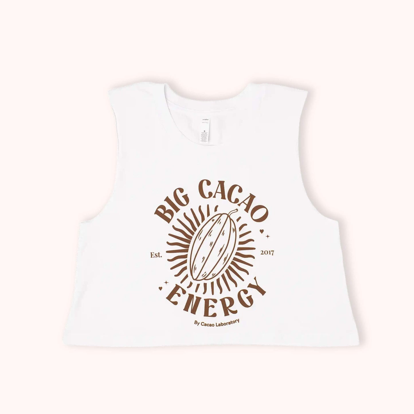 A white sleeveless crop top featuring a brown graphic print of a cacao pod with the text 'BIG CACAO ENERGY' and 'By Cocoa Laboratory' on a light cream background.