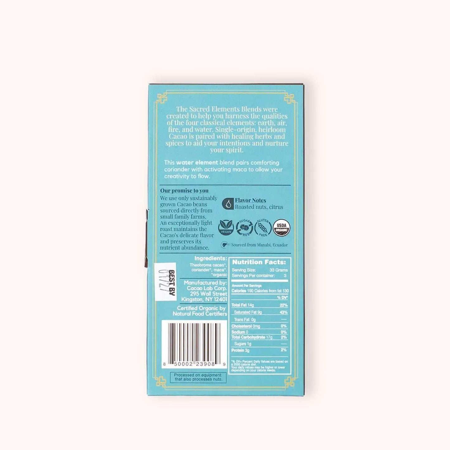 The back cacao laboratory ceremonial cacao water blend box is shown flat against a light cream background. The box is light blue with gold decorative borders and contains product description text, a barcode, and a nutrition facts panel.