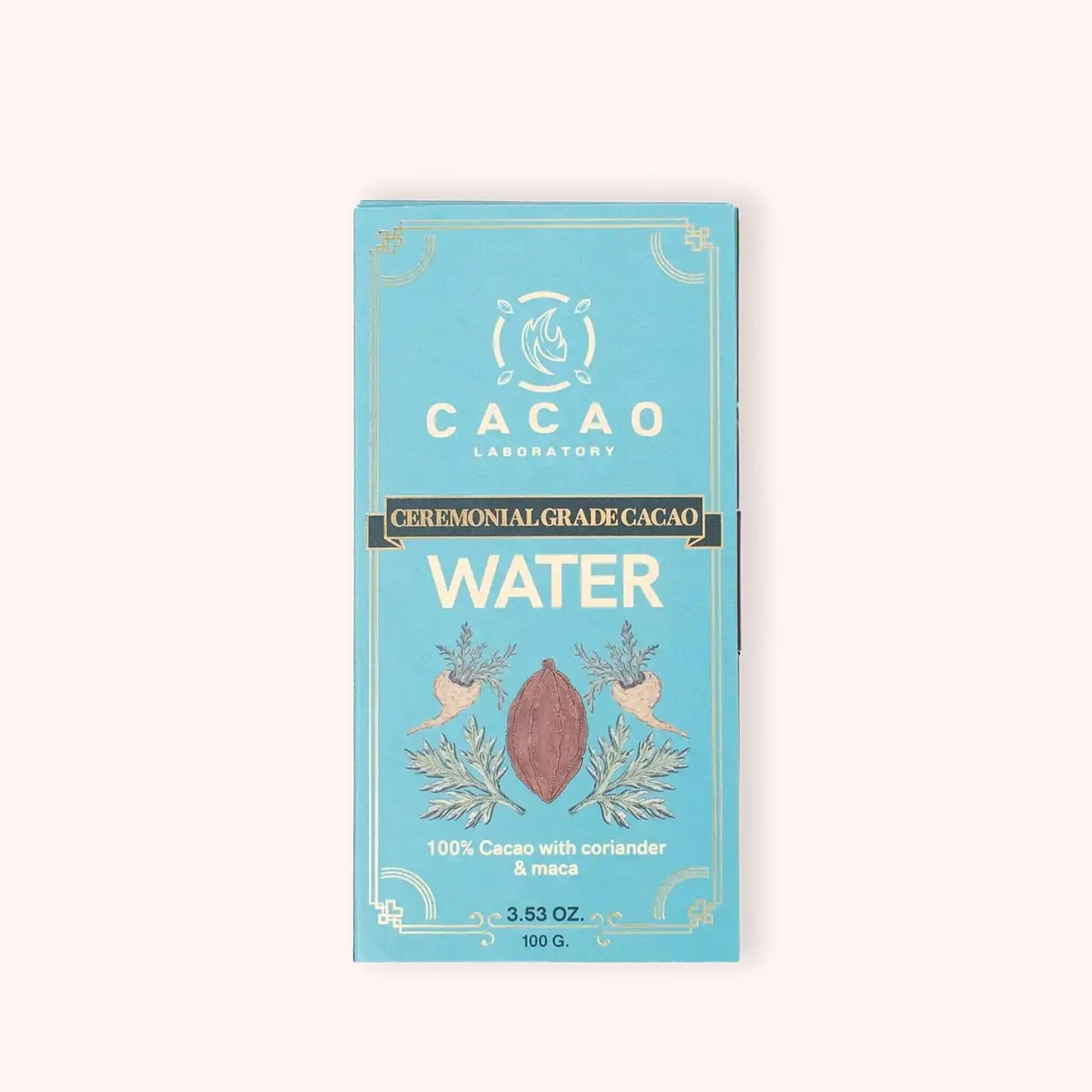 A single bar of Cacao Laboratory Ceremonial Grade Cacao Water bar in a light blue package with gold and white lettering, set against a solid pale pink background.